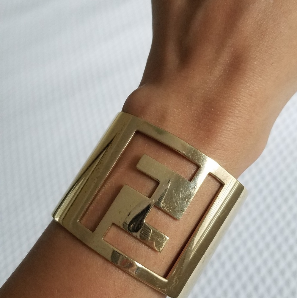 Authenticated FENDI gold FF logo cuff bracelet